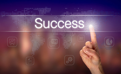 A hand selecting a Success business concept on a clear screen with a colorful blurred background.