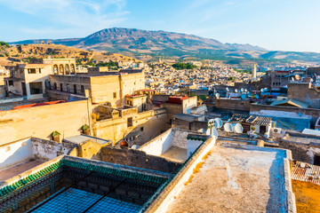 Wall Mural - Cityscape View over the rooftops of largest medina in Fes, Morocco in Africa