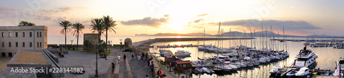 Photo  Alghero, Italy - Panoramic view of the Alghero historic quarter and marina with St