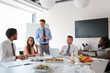 © Monkey Business - Businessmen And Businesswomen Meeting In Modern Boardroom Over Working Lunch