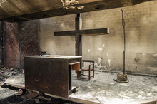 Beautiful Altar And Huge Cross In A Church Or Chapel Destroyed By Fire. Ruins Of A Recent Burned Religious Place. Power Of Fire.