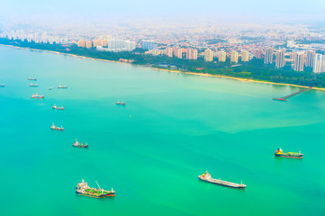 Wall Mural - Singapore harbor with freight ships