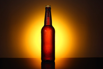 Wall Mural - A bottle with a beer on a beautiful background