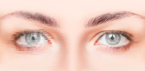 Close-up face of beautiful girl with beautiful grey eyes and big pretty eyelashes