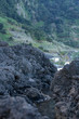 © Luis - Beautiful black rock beach in Seixal, Madeira with waves crashing