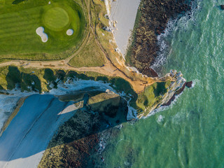 Drone view of a golf field next to the ocean in Etretat France