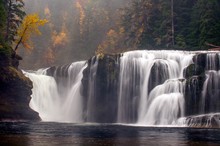 A Foggy Autumn Morning At Lower Lewis Falls In Washington State