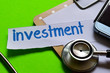 © syahrir - Investment on Healthcare concept with green background