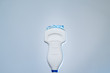 Ultrasound probe with sonographic gel high key blue light background
