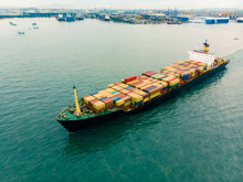 Fresh Colorful Container Cargo Ship, Business International Trade And Container Logistics Export-import Harbor To The International Port / Shipping Containers Concept. Bird's-eye View From Drone.