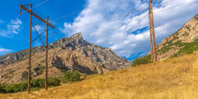 Power Lines On A Grassy Hill In Provo Canyon Utah