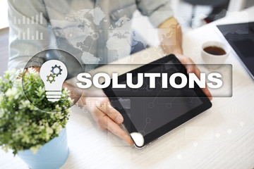 Business solutions concept on the virtual screen.