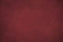 Background Of Dark Red Suede Fabric Closeup. Velvet Matt Texture Of Wine Nubuck Textile With Gradient.