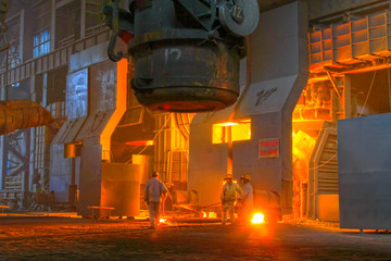 Technical staff check the quality of molten steel, in a iron and steel co., China