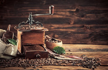 Old Vintage Coffee Mill With Roasted Beans