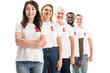 © LIGHTFIELD STUDIOS - happy group of people in blank white t-shirts standing in row with aids awareness red ribbons isolated on white