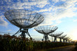 © zhengzaishanchu - The silhouette of a radio telescope