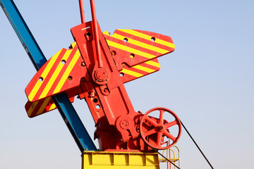 Wall Mural - The crank balanced beam pumping unit in the JiDong oilfield, on December 1, 2013, caofeidian, hebei province, China.