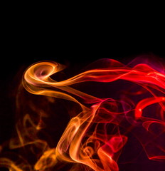 Colored smoke on black background