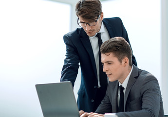 two businessmen working in the office.