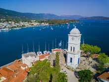 The Clock Tower Of Poros Island, Greece. Aerial Drone Photo