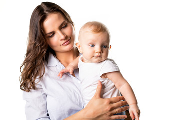 Wall Mural - A mother holdng his baby on studio white background