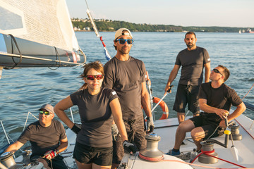 Wall Mural - Team athletes Yacht training for the competition