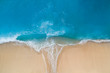 © Craig Parry - Aerial view of turquoise sea and sandy shore