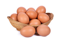 Eggs In Basket Isolated In White Background
