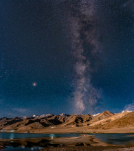 Panorama Of Arching Milky Way Galactic Center Over The Mountain At Pangong Lake Or Pangong Tso, Ladakh, Jammu And Kashmir, India.