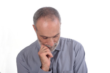 Wall Mural - thinking middle-aged man with shirt and white background