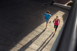 © Rido - Mature couple jogging at sunset