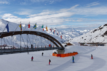 Wall Mural - Val Thorens, France - March 1, 2018: Val Thorens viewed from a slope with skiers