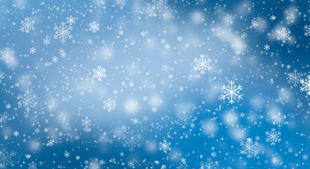 Blue bokeh background with snowflakes. Empty winter background, snowy, celebratory.