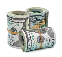 Rolled American Dollars Banknotes. Close Up Shot Isolated On White Background Including Clipping Path.