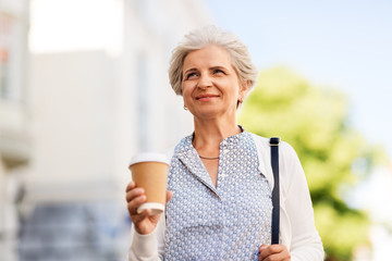 old age, retirement and people concept - close up of happy senior woman drinking coffee at summer city