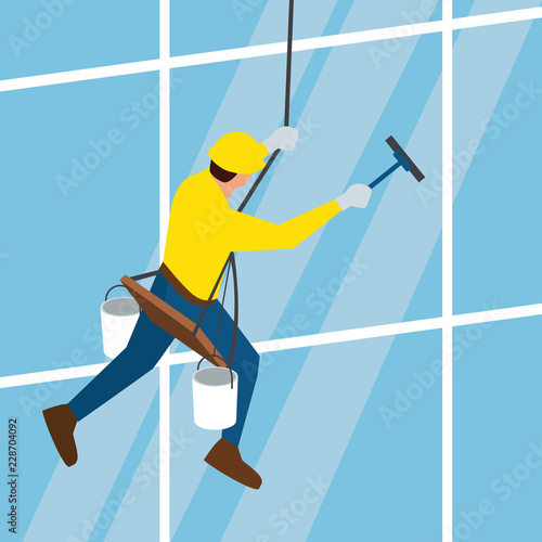 Fotografie, Obraz glass cleaner of steeplejack washing a skyscraper windows