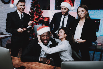 Wall Mural - Young People Celebrating New Year in Modern Office