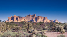 The Superstition Mountainsi Is A Range Of Mountains In Arizona Located To The East Of The Phoenix Metropolitan Area.   Clear Blue Sky Great For Dropping Text Onto.