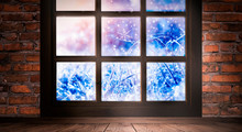 The Window Is Frozen, Frosty Morning, Snowflakes On The Glass, An Empty Room With A Window, An Old Brick Wall And A Wooden Floor. Part Of The Background Is A Cozy Interior. Sunlight Squared Frozen Win