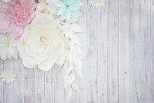 Pastel Paper Flower; Cream, White, Pink, Green, Blue With Hand Craft Art On The White Wood Plate Background.