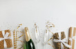 © New Africa - Creative flat lay composition with bottle of champagne and space for text on white background