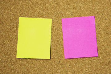 Wall Mural - collection of colorful post it two sheet. paper note reminder sticky notes on cork bulletin board. empty space for text.		