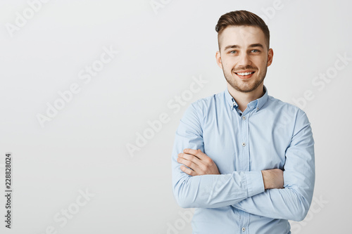 Cuadros en Lienzo Confident and friendly handsome ambitious man with bristle in blue collar shirt