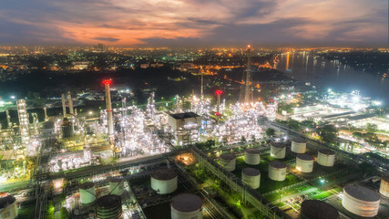 Wall Mural - Oil refinery factory and tanker boat with beautiful sky at dusk for energy or gas industry or transportation background.