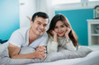 © whyframeshot - lovely asian couple sweet moment morning time on bed