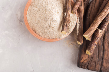 Wall Mural - Powder and licorice root on the table - Glycyrrhiza glabra