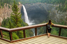 Tourist Looking At Helmcken Falls In Wells Gray Provincial Park, British Columbia, Canada