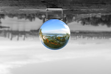 Autumn Kiev Landscape In The Glass Sphere. Inverted Black And White World