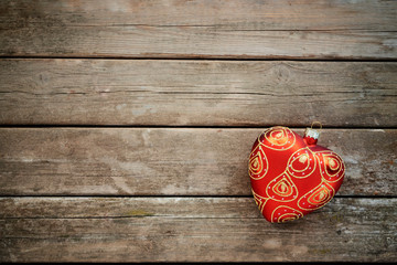 Wall Mural - New year or Christmas background. Toy rustic glass red heart